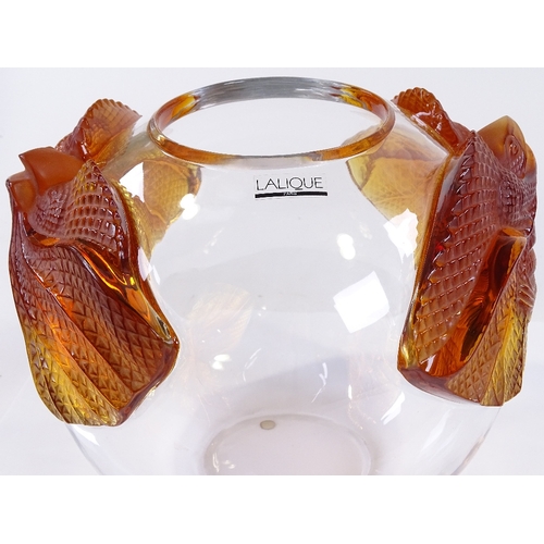 106 - A large modern Lalique clear glass bowl, with amber glass dragon design mounts, height 22cm, perfect... 