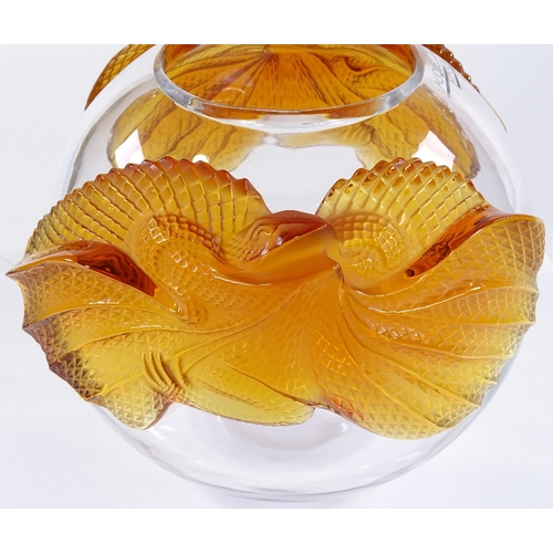 106 - A large modern Lalique clear glass bowl, with amber glass dragon design mounts, height 22cm, perfect... 