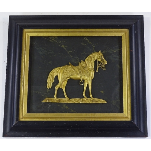 107 - A 19th century relief-cast gilt bronze sculpture of Wellington's horse Copenhagen, mounted in moulde... 