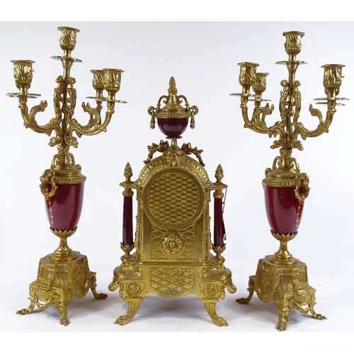 109 - An ornate reproduction French gilt-brass cased clock garniture, with 8-day striking movement, clock ... 