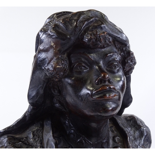 110 - A 19th century bronze patinated ceramic bust of an Arab woman, unsigned, overall height 35cm