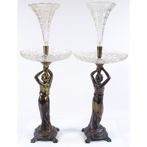 113 - A pair of cut-glass and electroplate table centre epergnes, supported by Classical female figures, h... 