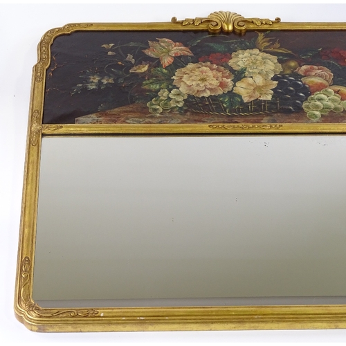 114 - An ornate Continental carved giltwood-framed wall mirror, with inset oil painting on canvas, depicti... 