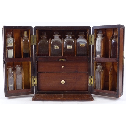 115 - A 19th century mahogany apothecary cabinet, with recessed brass carrying handle, the interior fitted... 