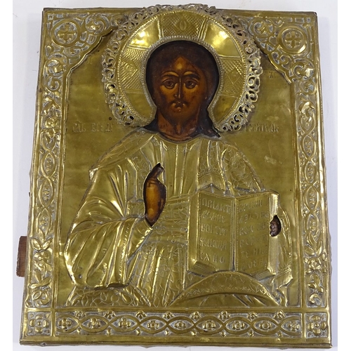 116 - An Antique Russian or Greek embossed brass-framed icon, 44cm x 37cm