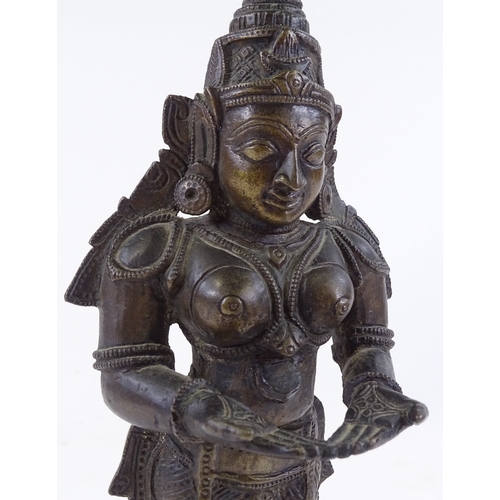 117 - An Antique Indian patinated bronze standing figure of a god, height 24cm