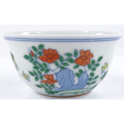 122 - A Chinese doucai enamel chicken cup, with 6 character mark, height 4cm, diameter 8cm