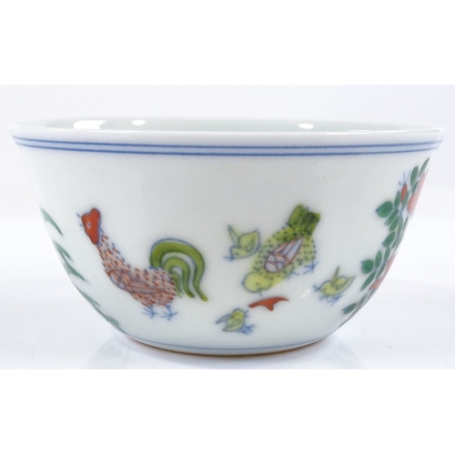 122 - A Chinese doucai enamel chicken cup, with 6 character mark, height 4cm, diameter 8cm