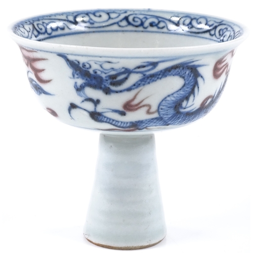 124 - A Chinese blue and red decorated stemmed cup, height 9cm, diameter 10cm