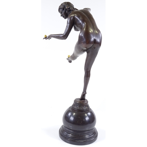 125 - A reproduction bronze naked dancer on marble domed base, height 46cm