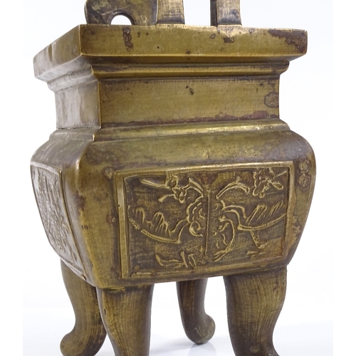 126 - A Chinese rectangular cast-brass censer, with relief panels, height excluding handles 19cm, length 1... 