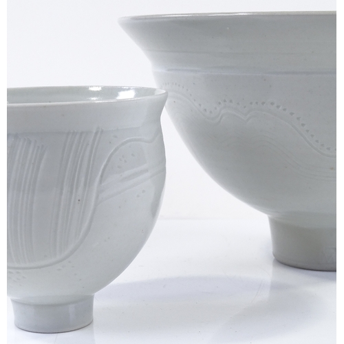 127 - Michael (Mick) Casson, 2 white celadon glaze bowls with sgraffito decoration, diameter 25cm and 12cm... 