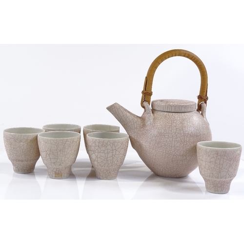 129 - David Leach crackle glaze teapot and 6 matching tea bowls (2 A/F)