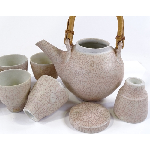 129 - David Leach crackle glaze teapot and 6 matching tea bowls (2 A/F)