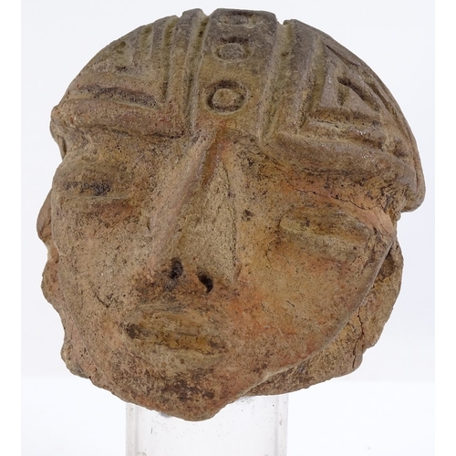 130 - A terracotta antiquity head sculpture, height 9cm