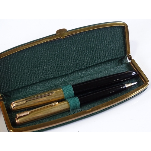 134 - A Parker gold plated fountain pen and matching propelling pencil, cased