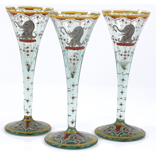 16 - A set of 3 Antique funnel-shaped glasses, possibly German or Italian, with hand painted elephant arm... 