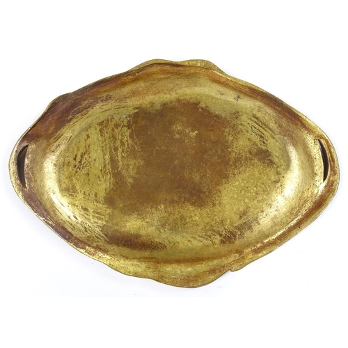 64 - A Bouny, gilt patinated bronze 2-handled dish, with relief cast floral decoration, signed, length 26... 