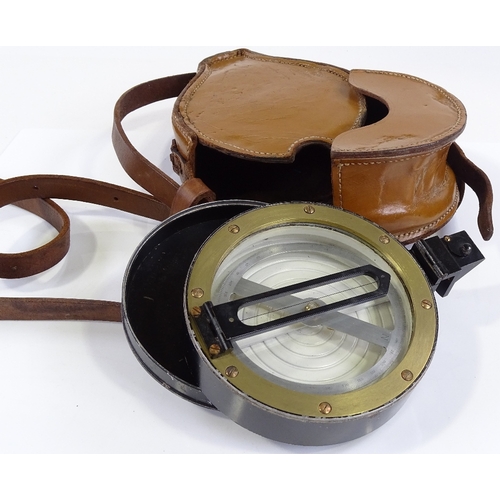 65 - An artillery prismatic compass by Francis Barker & Son, diameter 12cm, in original leather case