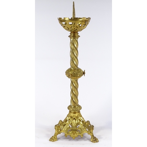 68 - A 19th century gilt-metal Gothic design pricket candle stand, height 61cm