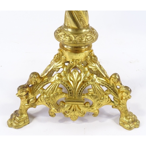 68 - A 19th century gilt-metal Gothic design pricket candle stand, height 61cm