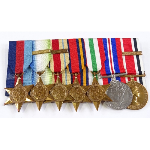 71 - A group of 7 Second War General Service medals, awarded to Ron Anson RNR, who served on board HMS Ne... 