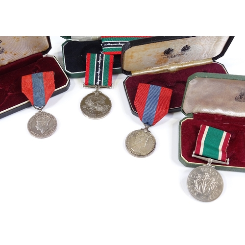 75 - 2 Imperial Service medals, a Women's Voluntary Service medal, and a POW medal, all cased (4)