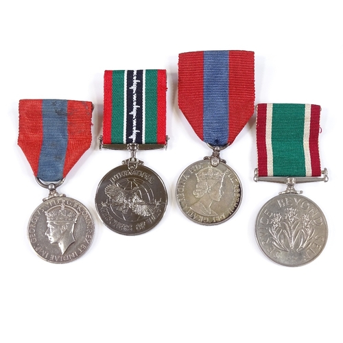 75 - 2 Imperial Service medals, a Women's Voluntary Service medal, and a POW medal, all cased (4)