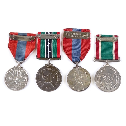 75 - 2 Imperial Service medals, a Women's Voluntary Service medal, and a POW medal, all cased (4)