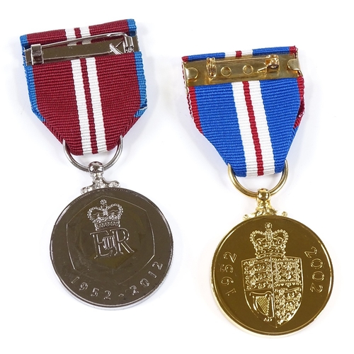 77 - 2 Queen's Golden and Diamond Jubilee medals, cased