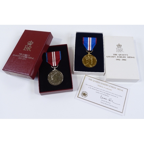 77 - 2 Queen's Golden and Diamond Jubilee medals, cased