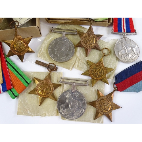 79 - 5 Second World War medals with Africa clasp, ribbons and papers, and 3 boxed Second War Period medal... 