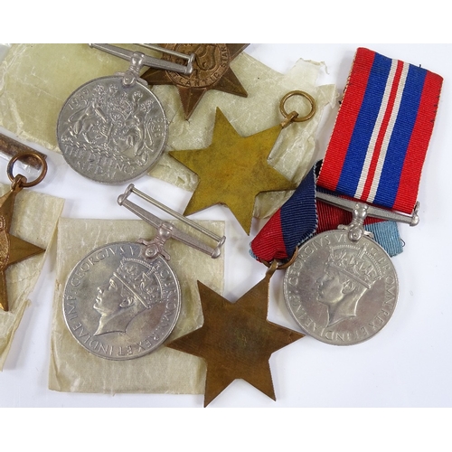 79 - 5 Second World War medals with Africa clasp, ribbons and papers, and 3 boxed Second War Period medal... 