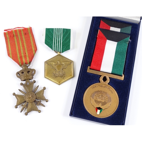 82 - An American military Merit medal, an Iraq medal 1991, and a Belgian Cross (3)