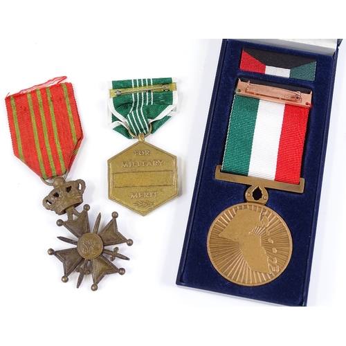 82 - An American military Merit medal, an Iraq medal 1991, and a Belgian Cross (3)