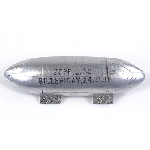 91 - An aluminium lapel badge made from the wreckage of Zeppelin L32, Billericay 24th September 1916, len... 