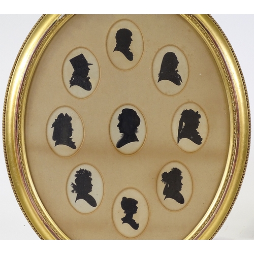 1140 - A set of 9 hand painted silhouettes, mounted in common gilt-gesso oval frame, overall dimensions 22