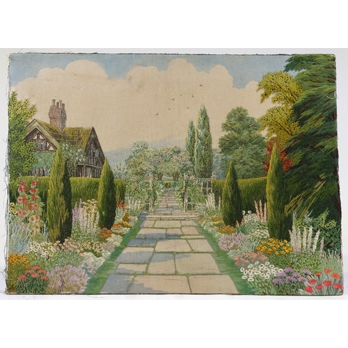 1298 - A finely detailed early 20th century embroidered picture, an English country garden, 19