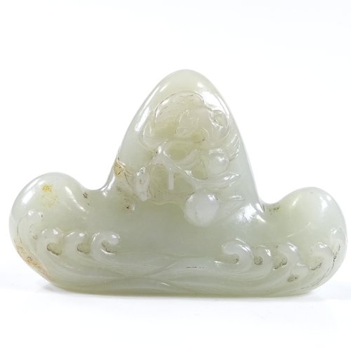 104 - A Chinese relief carved jade calligraphy pen-rest, with wave designs, length 8cm