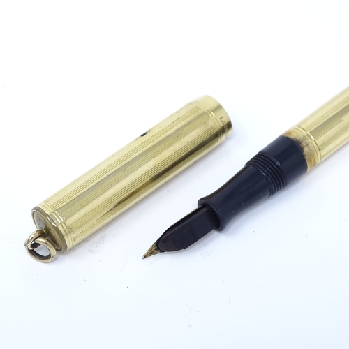 114 - A Vintage Ideal gold plated fountain pen, length 9cm