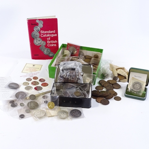 122 - A collection of coins and tokens, including some silver