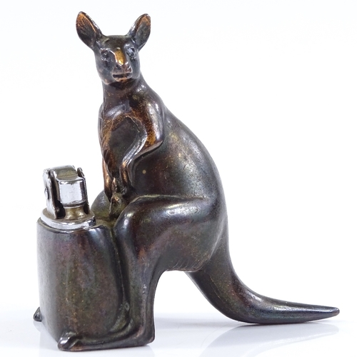 124 - A nickel plate novelty kangaroo design table lighter, height 9cm