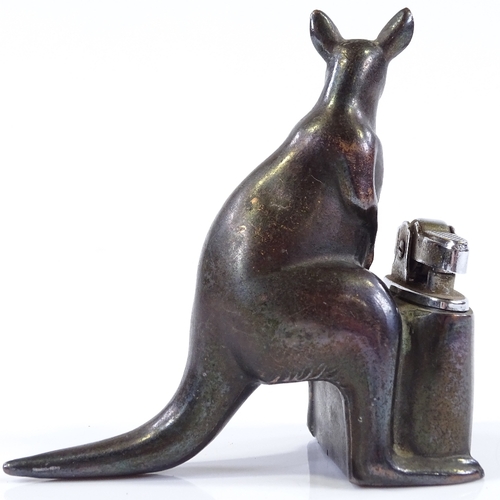 124 - A nickel plate novelty kangaroo design table lighter, height 9cm