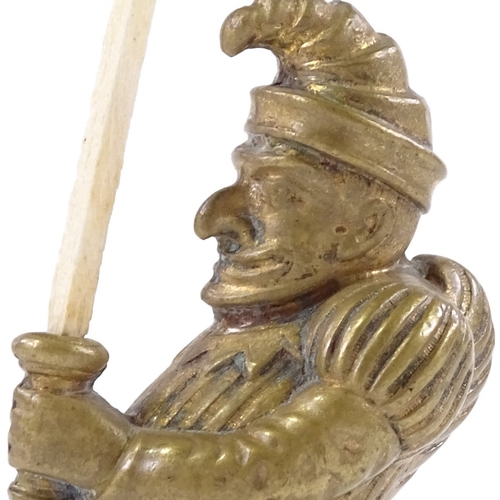 125 - A Victorian brass Mr Punch design Go to Bed Vesta case, height 5.5cm