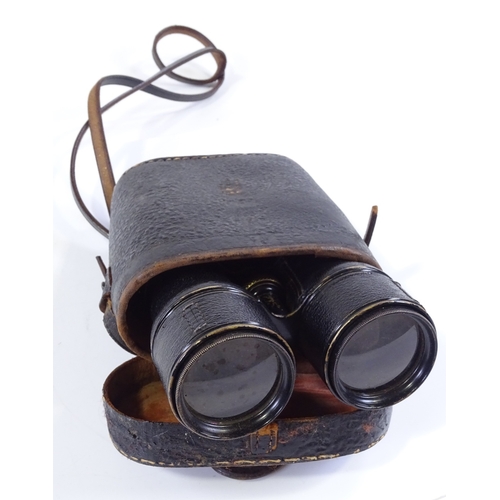 49 - A pair of le Maire brass and leather binoculars, circa 1900, with rotating theatre field and marine ... 