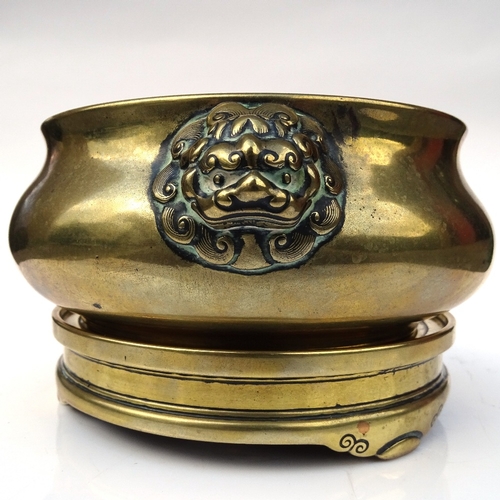 5 - A Chinese bronze incense burner / censer, late Ming / early Qing dynasty, relief cast dragon mask ha... 