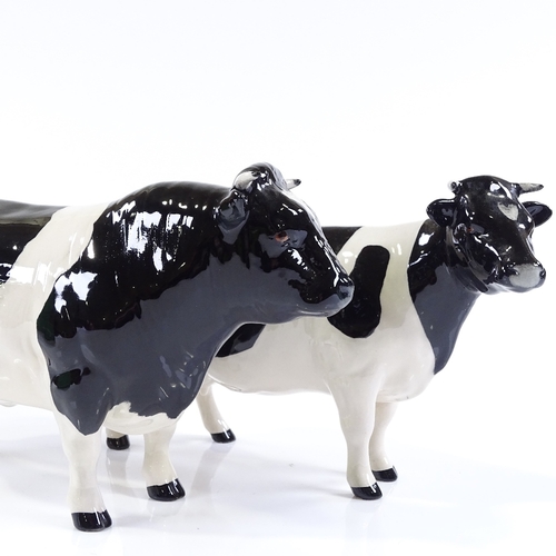 70 - A Beswick Friesian bull and Beswick Friesian cow, boxed (2)