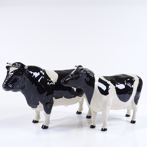 70 - A Beswick Friesian bull and Beswick Friesian cow, boxed (2)