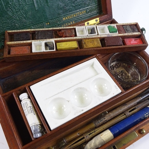 74 - A Victorian mahogany artist's paintbox by J Newman of Soho Square, original embossed leather-lined l... 