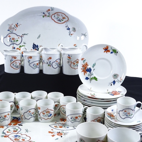 83 - A Limoges Christian Dior Imari pattern tea service, including 6 various jugs and 2 trays